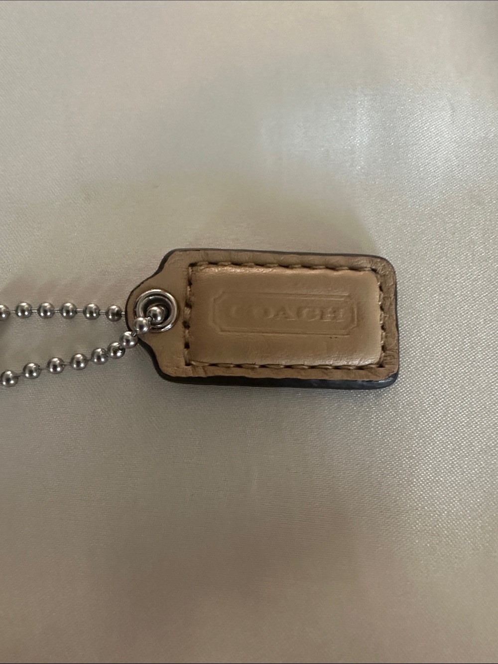 Coach Beige/light brown Leather Hang Tag with Ball Chain